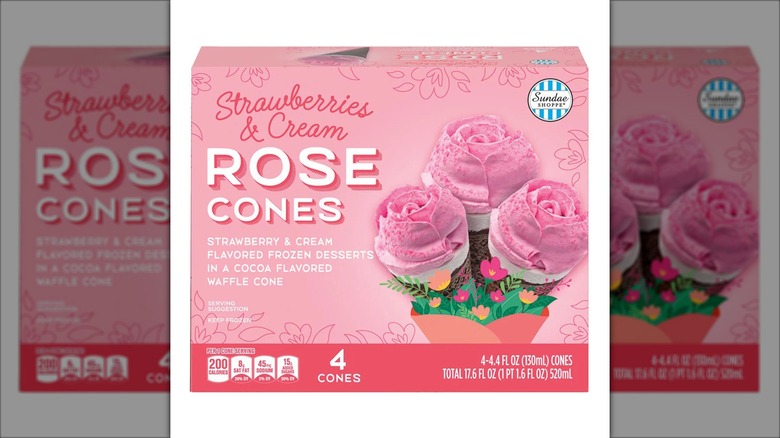 ice cream cones with rose shaped tops in pink box