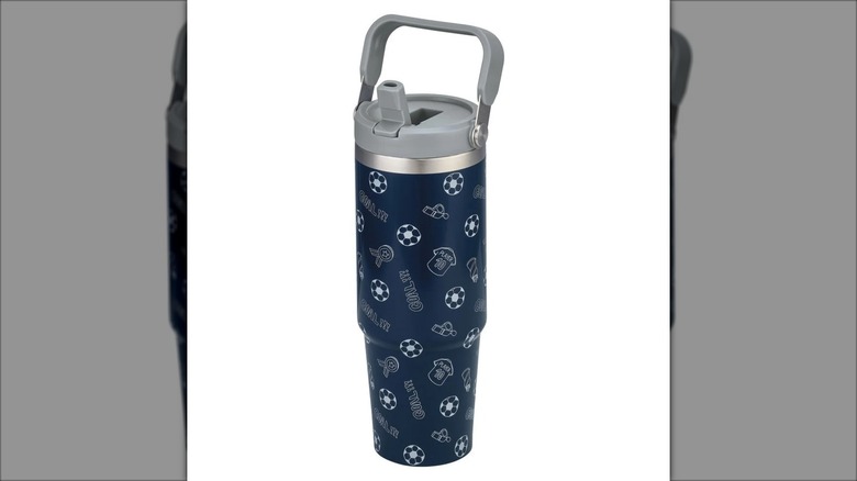 navy blue stainless tumbler with soccer pattern