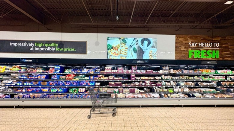 aldi shopping cart in store aisle