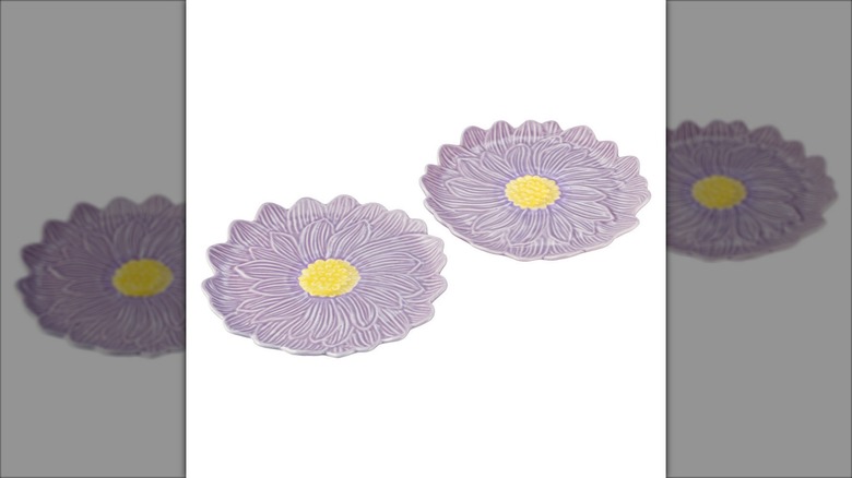 purple flower-shaped plates on white background