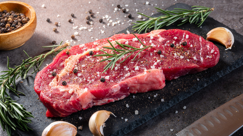 Beef steak seasoned with sea salt and cracked pepper.