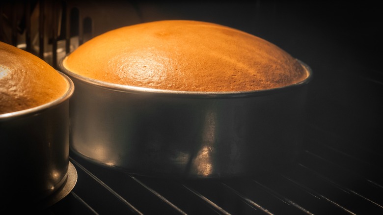 Cakes rising in oven