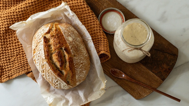 sourdough bread with starter in jar
