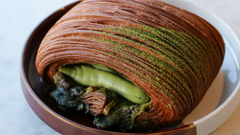 Matcha Pain Suisse pastry on plate