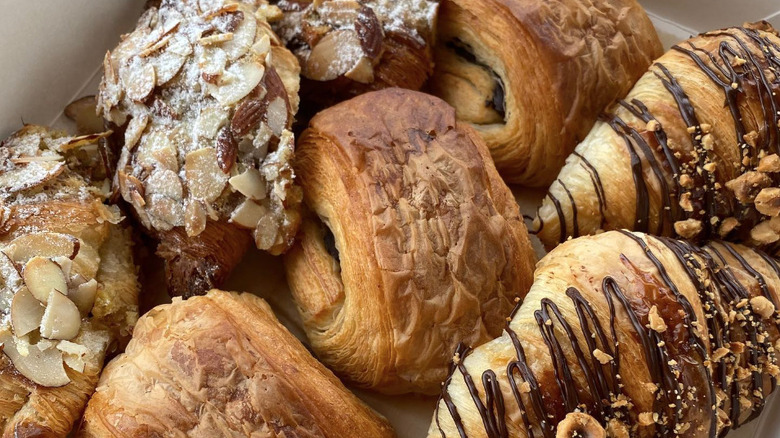 Pastry box filled with three kinds of croissants