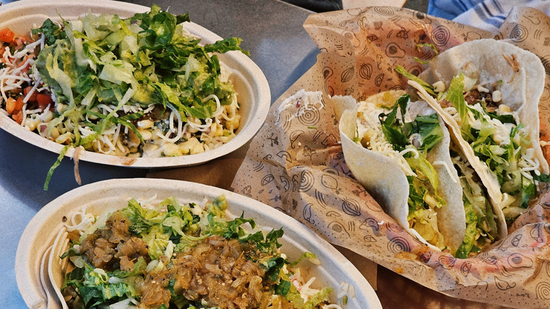 Closeup of bowls from Chipotle with branded packaging