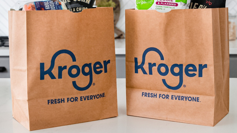 paper kroger-branded bags on countertop