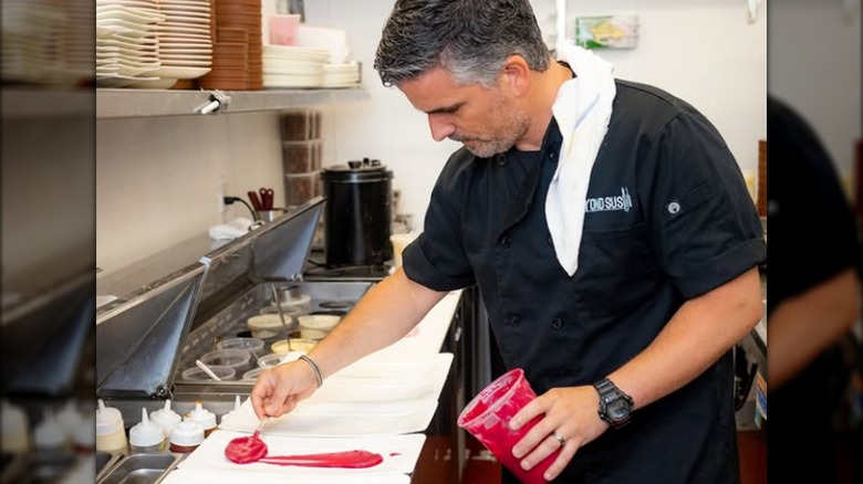 Chef Guy Vaknin working in kitchen