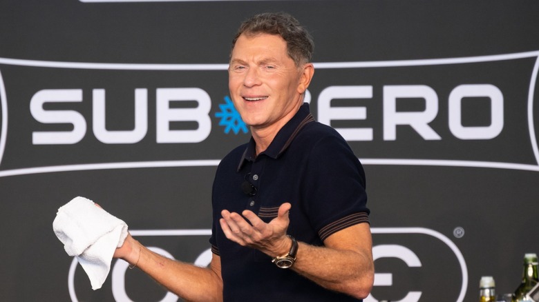 bobby flay gives a cooking demonstration