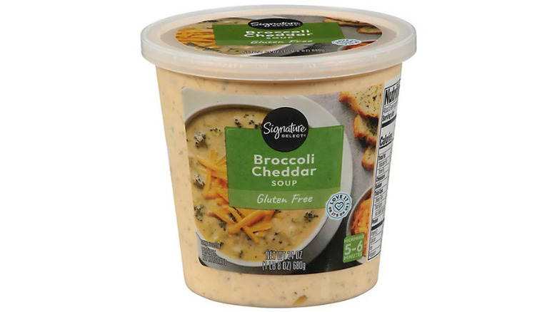 Plastic container of Signature Select Broccoli Cheddar Soup