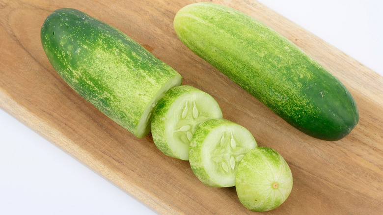 A mature cucumber sliced with seeds on show