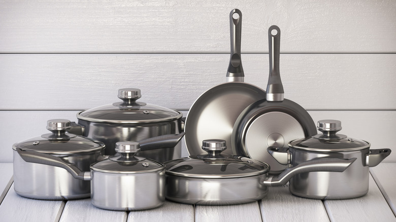 A set of stainless steel cookware