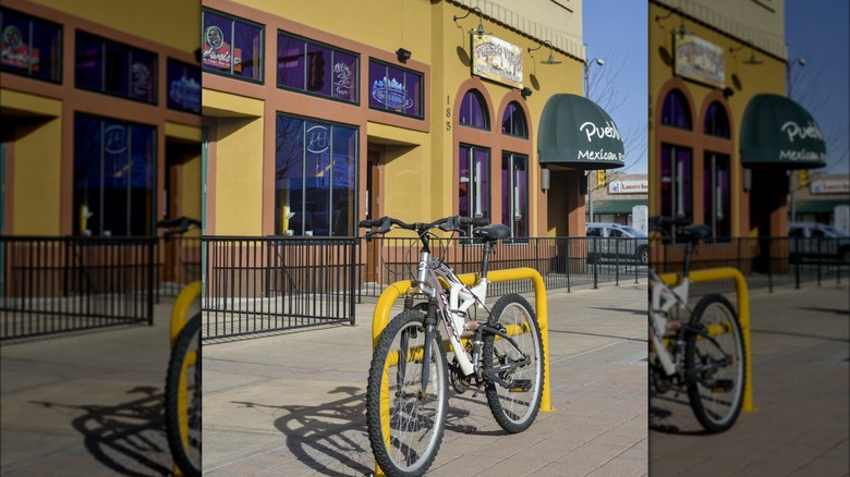 mountain bike parked in front of Mexican restaurant