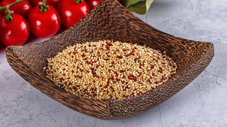 Uncooked mixed quinoa seeds in a bowl