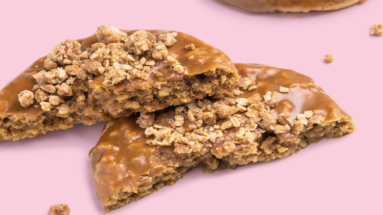 Crumbl Maple Oatmeal cookie on pink background