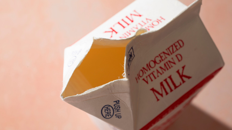 Top down view of open carton of milk