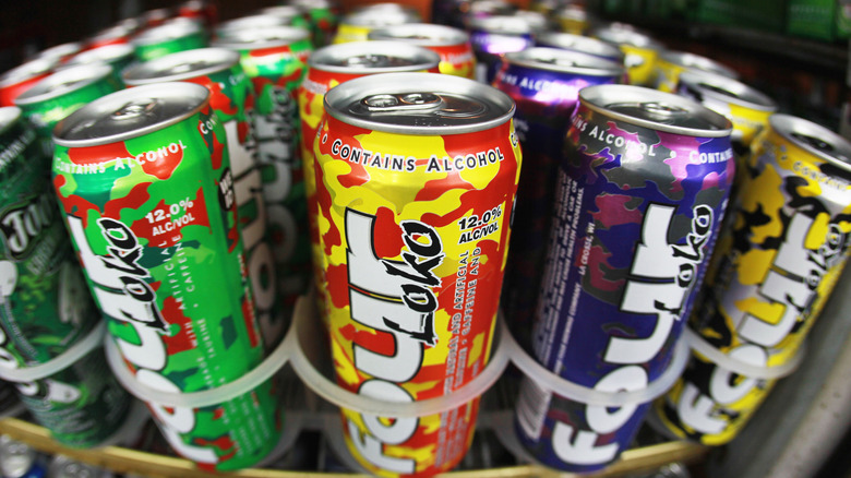 Four Loko cans stacked on shelf