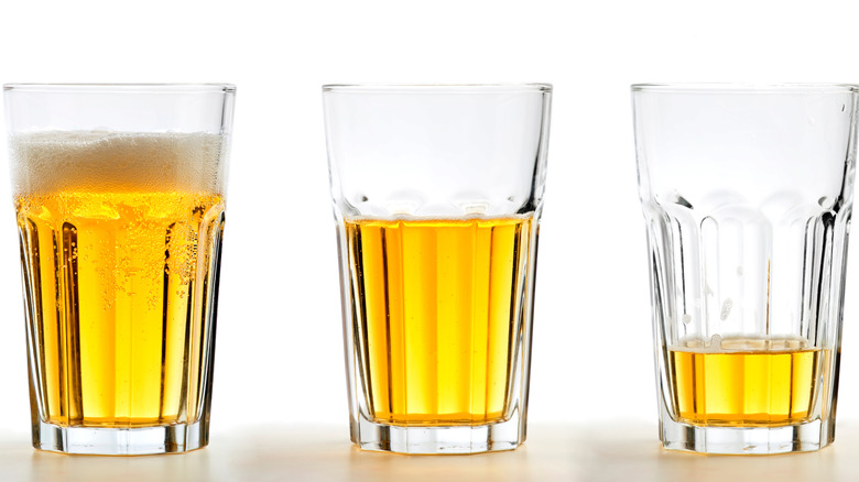 Partially Empty Beer Glasses