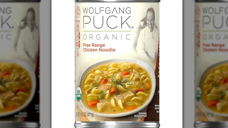 A close up of a can of Wolfgang Puck Organic Free Range Chicken Noodle soup