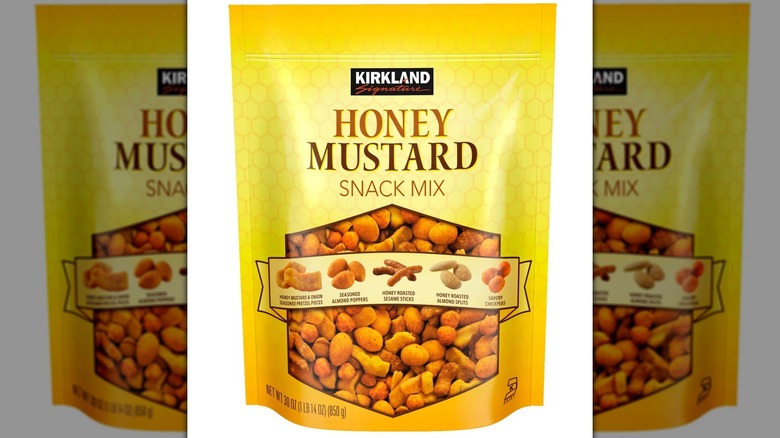 A packet of Kirkland Signature Honey Mustard Snack Mix