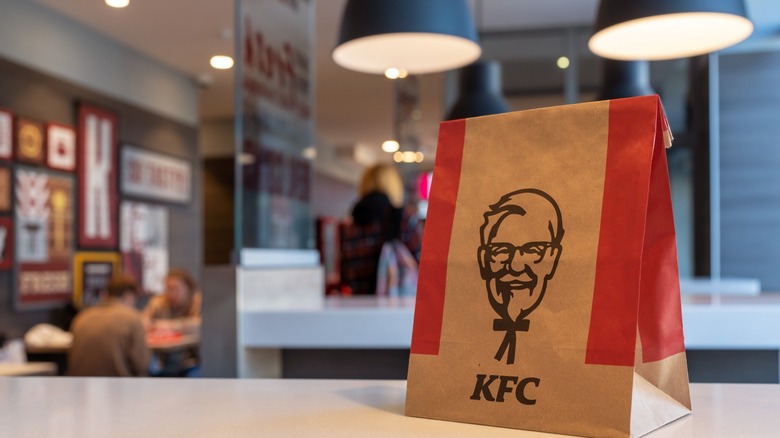 kfc takeout bag on table