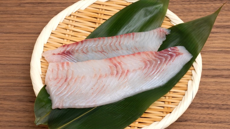 flounder filets on banana leaves