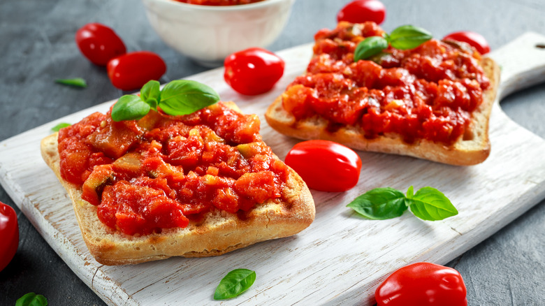 Bread covered in tomato sauce