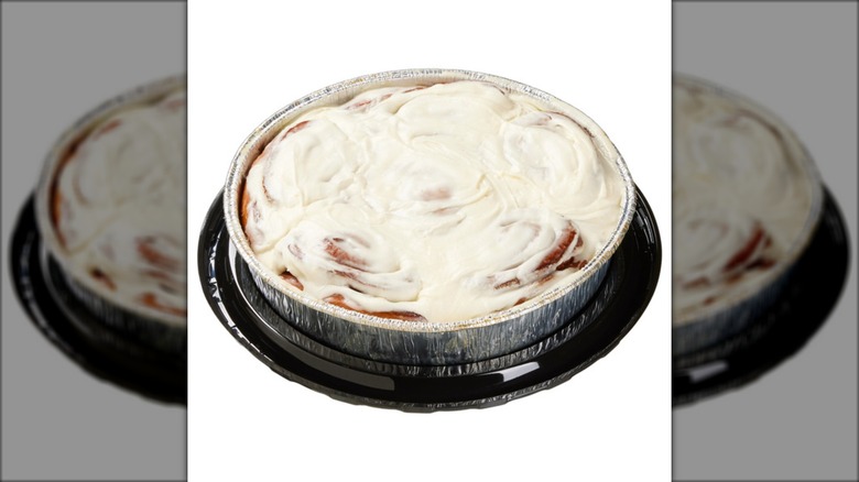 pan of costco cinnamon rolls with icing