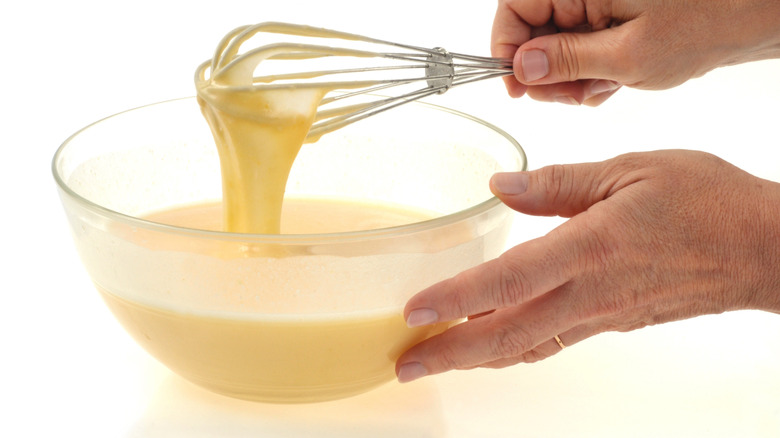 Preparation of cake dough with a whisk in a bowl