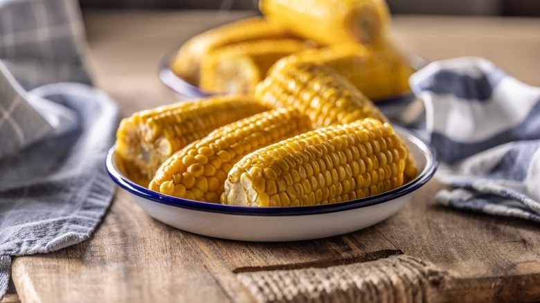 golden corn on the cob in a bowl
