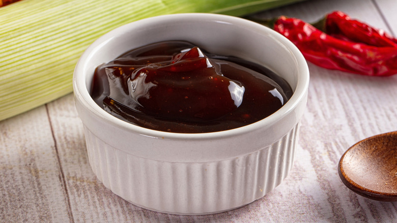A white bowl of hoisin sauce