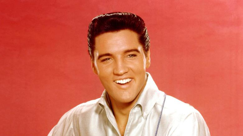 Elvis against red background