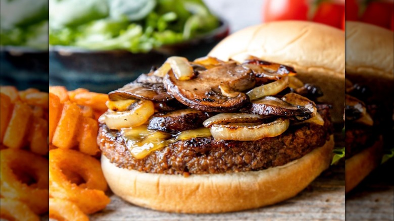 plant based burger with sauteed onions and mushrooms
