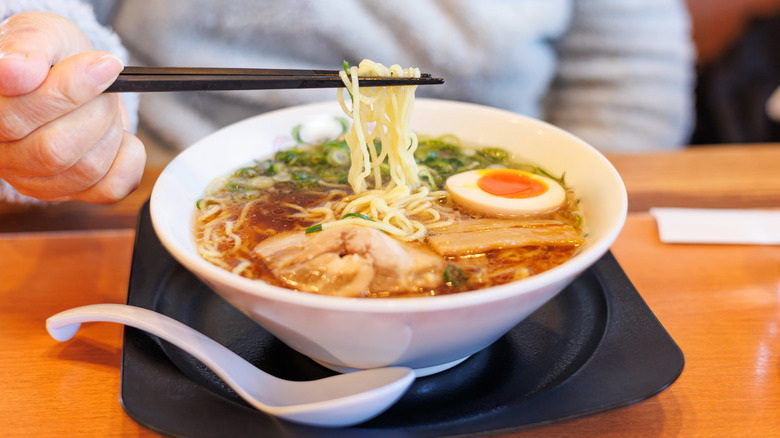 Man eating ramen