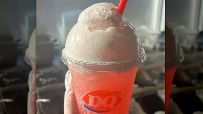 foaming strawberry drink in DQ cup