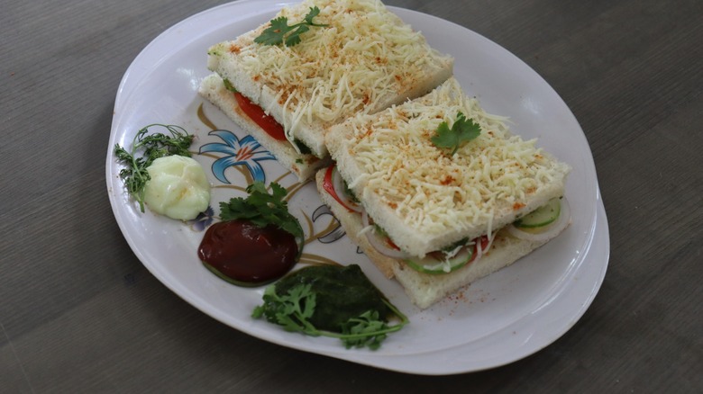 bombay cheese sandwich with veggies and sauces