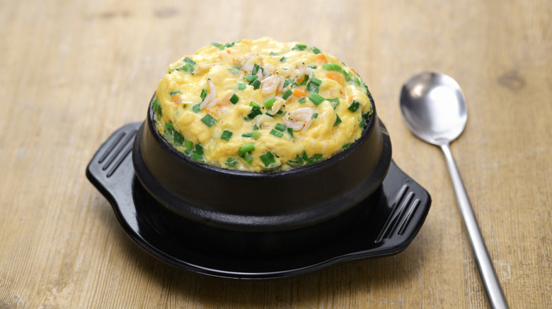 Gyeran jjim, or Korean steamed eggs, in small clay pot.