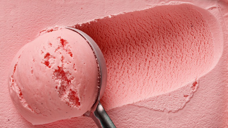 Scooping pink ice cream