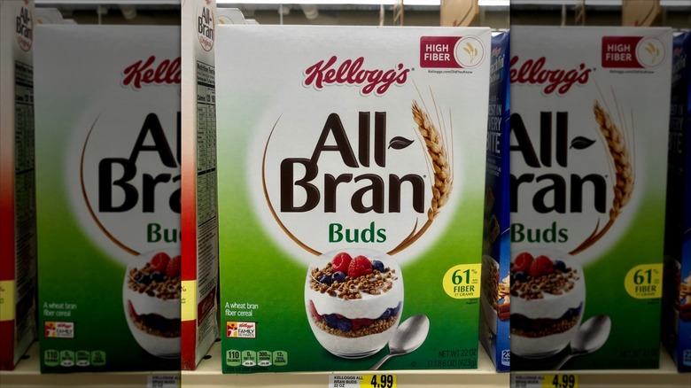 green box of kellogg's all-bran buds at grocery store