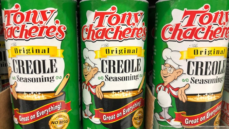 green shakers of creole seasoning