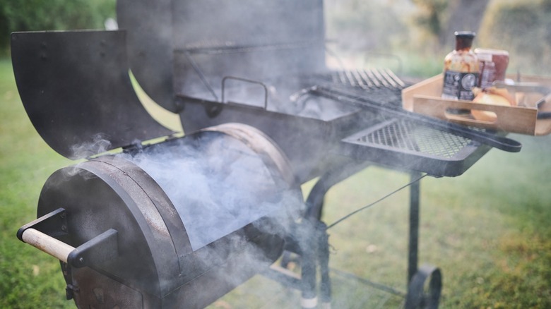 backyard smoker setup with grill
