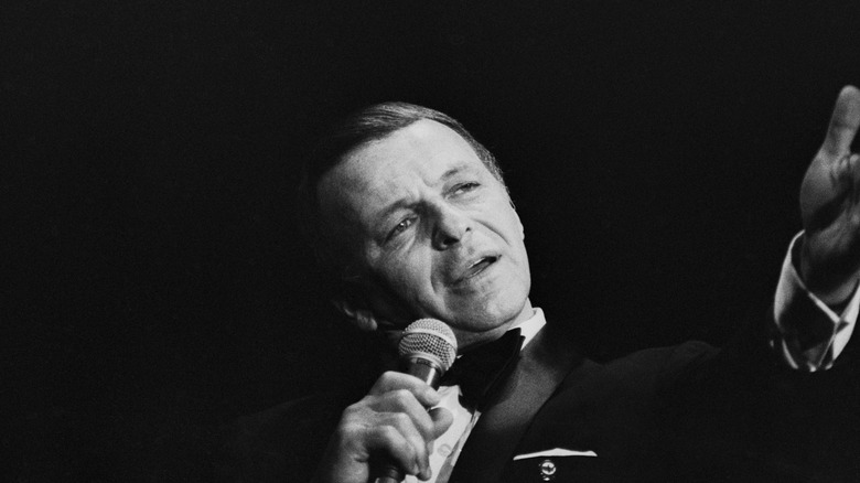 Frank Sinatra on stage with microphone, 1970