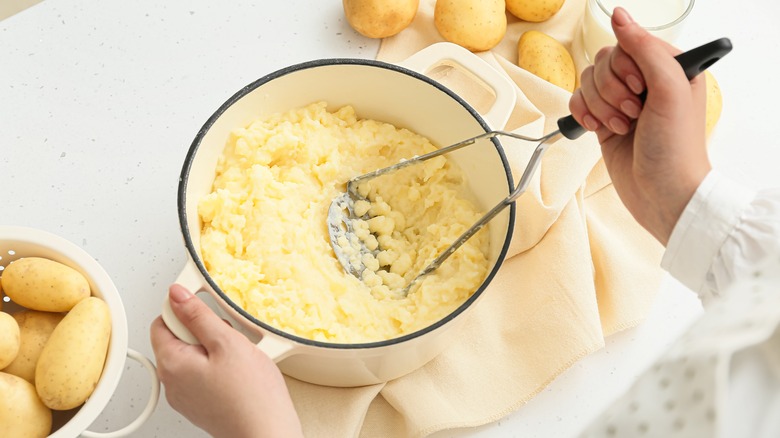 mashing potatoes