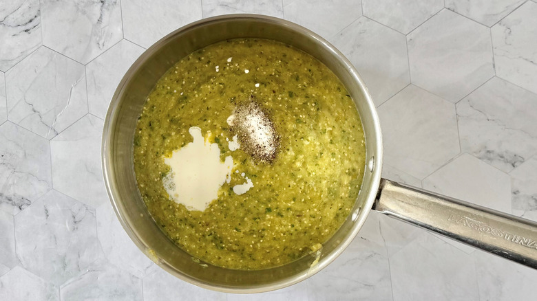 tomatillo sauce with cream in saucepan