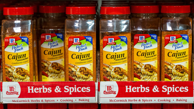 Jars of cajun seasoning in a store