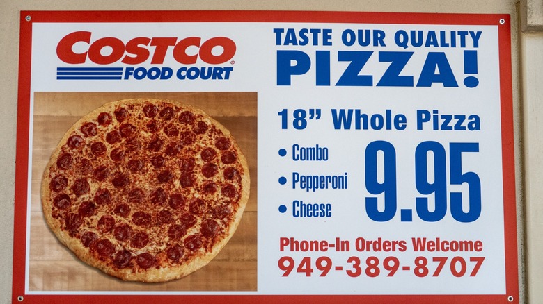 sign advertising costco's whol take-home pizza