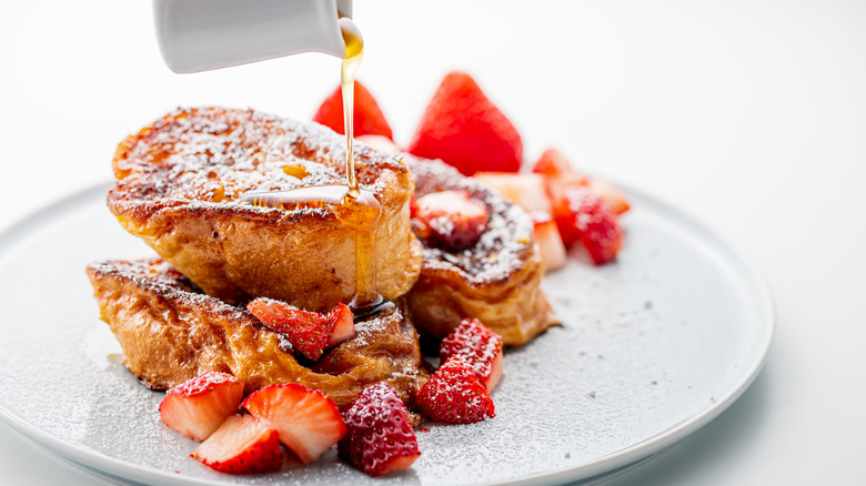 stack of french toast with strawberries