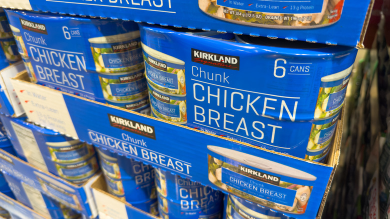 Cans of chicken in a store