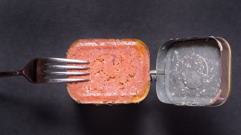 Top-down view of an open can of corned beef