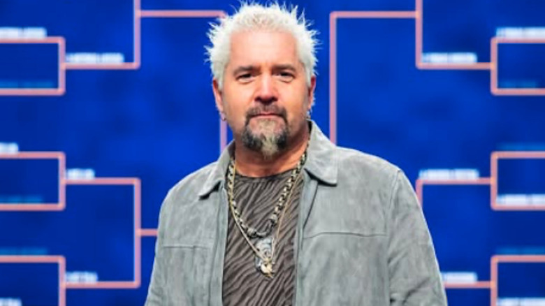 Guy Fieri on set looking at camera